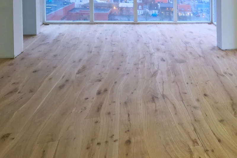 Natural oak hardwood flooring fitted in a bright room in Ireland